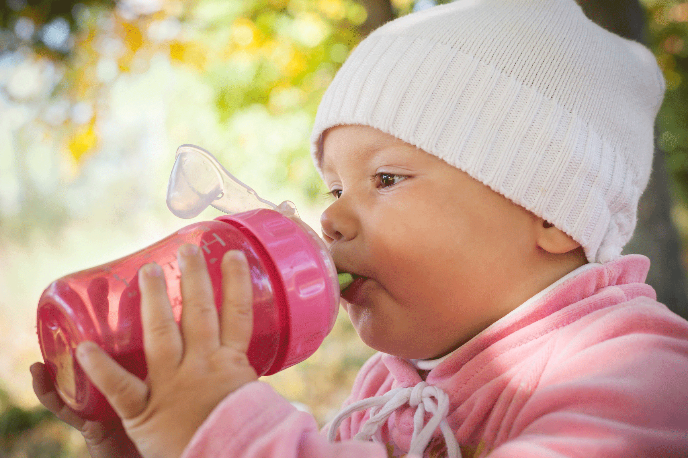 baby with sippy cup